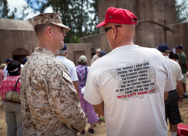 Former U.S. Marine Sgt. Dave Smith (right), a Vietnam veteran who served with Fox Company, 2nd Battalion, 3rd Marine Regiment, speaks with Gunnery Sgt. Tommy Vaughn, an infantry unit leader with 2/3, while viewing a military operations in urban terrain (MOUT) training facility during a visit to Marine Corps Training Area Bellows, Hawaii, Aug. 22, 2012. Smith, a native of Santa Ynez, Calif., served in Vietnam as a mortarman from 1967-1968. Nearly half a century since they fought through hell in Vietnam, approximately 30 former 2/3 Marines and their families visited the base to reminisce on their service and render honor to a brother lost in combat, Sgt. Maj. Wayne Hayes. Hayes was killed in action, Feb. 28, 1967, during Operation Prairie II while serving with many of the 2/3 veterans.
