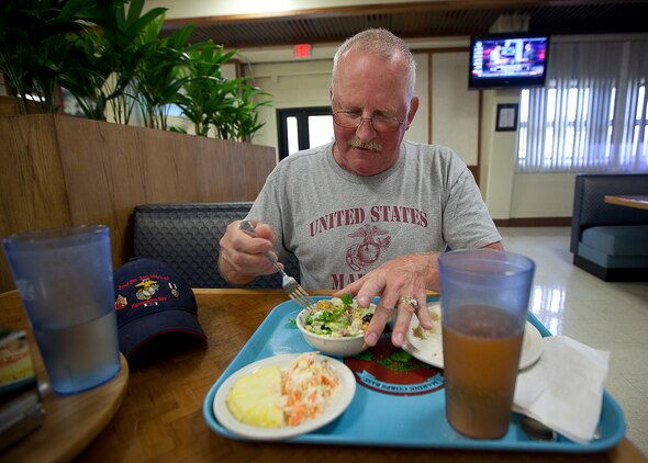 Former U.S. Marine Sgt. Milton “Spider” Hoch, a Vietnam veteran who served with Headquarters and Service Company, 2nd Battalion, 3rd Marine Regiment, eats lunch at the Anderson Hall Dining Facility on Marine Corps Base Hawaii, Aug. 22, 2012. Hoch, a native of Portland, Ore., was wounded twice while serving in Vietnam as a radio operator with 2/3. Nearly half a century since they fought through hell in Vietnam, approximately 30 former 2/3 Marines and their families visited the base to reminisce on their service and render honor to a brother lost in combat, Sgt. Maj. Wayne Hayes. Hayes was killed in action, Feb. 28, 1967, during Operation Prairie II while serving with many of the 2/3 veterans.