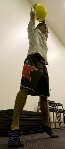U.S. Air Force Staff Sgt. Joshua Alverez, 7th Force Support Squadron, completes a medicine ball slam in the new Functional Fitness room Aug. 23, 2012, at Dyess Air Force Base, Texas. The new room, Dyess’ second functional fitness area, features approximately $20,000 worth of new equipment including total body exercise equipment, new bumper plates and varying sizes of medicine balls.  Functional fitness is designed around high intensity strength and conditioning exercises , which constantly vary and work on specific functional movements. (U.S. Air Force photo by Airman 1st Class Peter Thompson/ Released)  