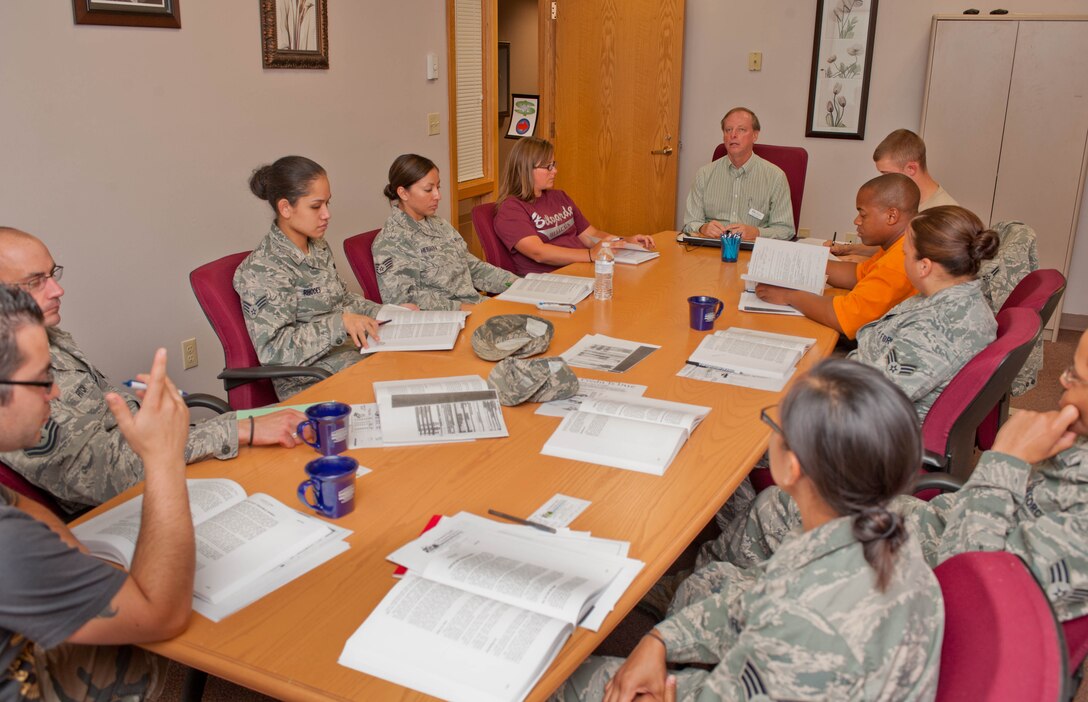 Airmen and their families attend a “Credit When Credit is Due” course for financial guidance at the Airman and Family Readiness Center at Ellsworth Air Force Base, S.D., Aug. 22, 2012. The course covered a variety of financial topics to help Airmen make sound financial decisions for themselves and their families. (U.S. Air Force photo by Airman 1st Class Zachary Hada/Released)