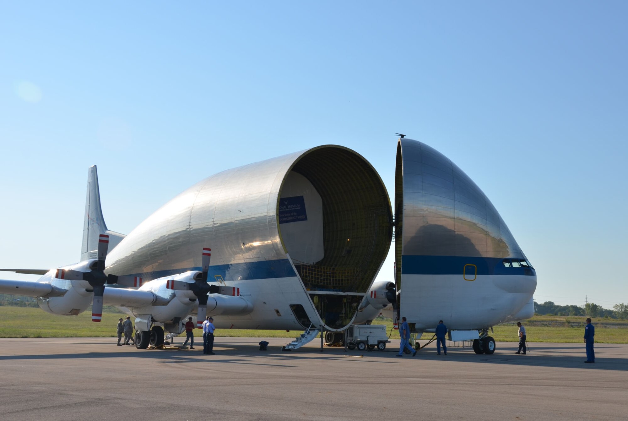 WRIGHT-PATTERSON AIR FORCE BASE, Ohio – NASA’s Super Guppy stands ready as 12 Airmen from the 87th Aerial Port Squadron prepare to unload NASA’s first Shuttle Crew Compartment Trainer from the aircraft Aug. 23.  With help from NASA loadmasters and National Museum of the United States Air Force restoration specialists, the CCT-1 was moved from the Super Guppy to the museum’s Cold War Gallery where its interior will be reassembled then put on display for the general public when it is moved to a new Space Gallery in the museum’s planned fourth building. (U.S. Air Force photo/Stacy Vaughn)