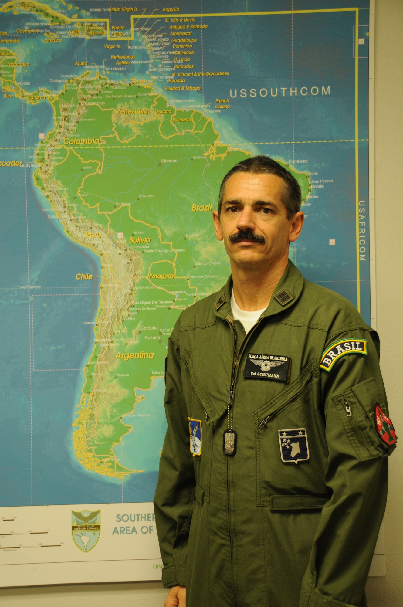 DAVIS-MONTHAN AIR FORCE BASE, Ariz. –  Col. Schumann, a fighter pilot in the Brazilian air force,  worked as a chief of combat operations during PANAMAX 2012 alongside Air Forces Southern, Aug. 6-17.  PANAMAX is an annual U.S. Southern Command-sponsored exercise that focuses on ensuring the defense of the Panama Canal. One of the most important benefits of multinational exercises like PANAMAX is the fact that all the participants were able to exchange their experiences, expertise gained new knowledge about each other's culture and people. These interactions strengthen our bonds across the region and foster long-lasting friendships and an understanding among the partner nations, ultimately benefiting the security of the region. (USAF photo by Tech. Sgt. Andria Sapp). 