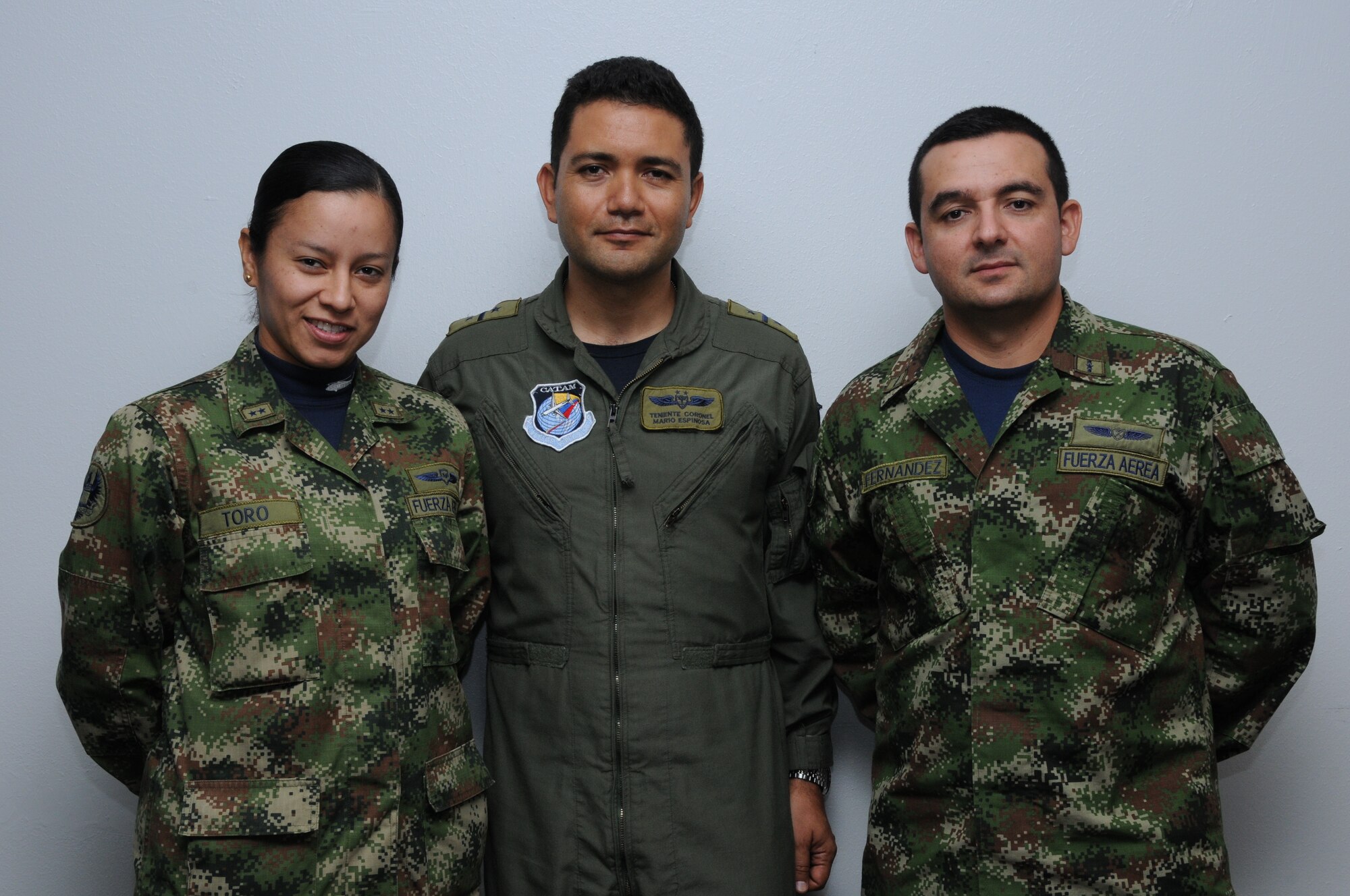 DAVIS-MONTHAN AIR FORCE BASE, Ariz. –  Lt. Col. Mario Espinosa, chief operations officer/doctrine officer for the Colombian air force (center), worked in planning operations  for PANAMAX 2012 alongside Air Forces Southern, Aug. 6-17.  PANAMAX is an annual U.S. Southern Command-sponsored exercise that focuses on ensuring the defense of the Panama Canal.  One of the most important benefits of multinational exercises like PANAMAX is the fact that all the participants were able to exchange their experiences, expertise gained new knowledge about each other’s culture and people.  These interactions strengthen our bonds across the region and foster long-lasting friendships and an understanding among the partner nations, ultimately benefiting the security of the region.