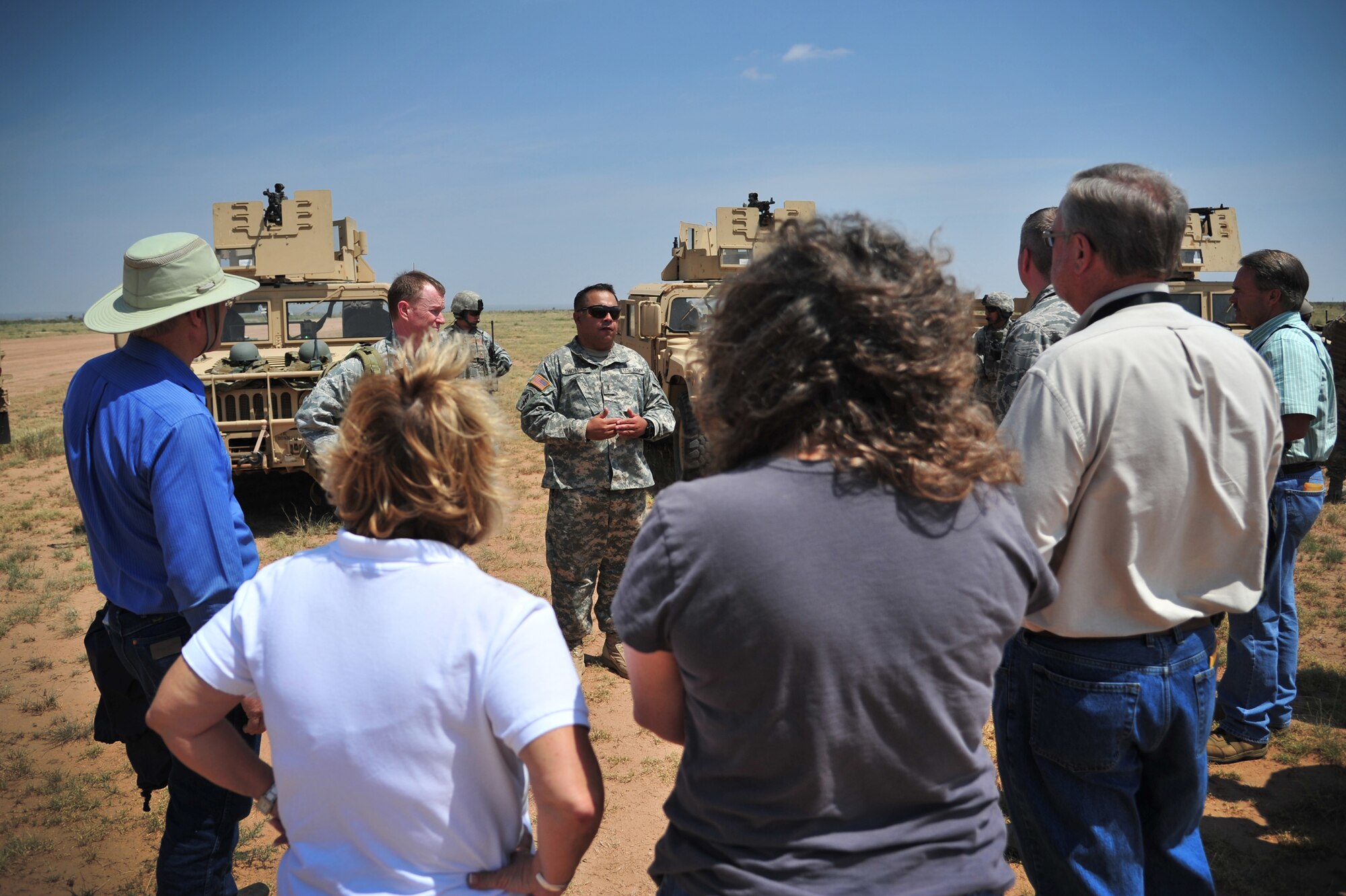 Cannon's honorary commanders a briefed prior to their tactical ground tour at Melrose Air Force Range, N.M., Aug. 22, 2012. The 27th Special Operations Wing Honorary Command Program is geared toward fostering military pride and local support from a broad group of surrounding community ambassadors.  (U.S. Air Force photo/Airman 1st Class Alexxis Pons Abascal)  