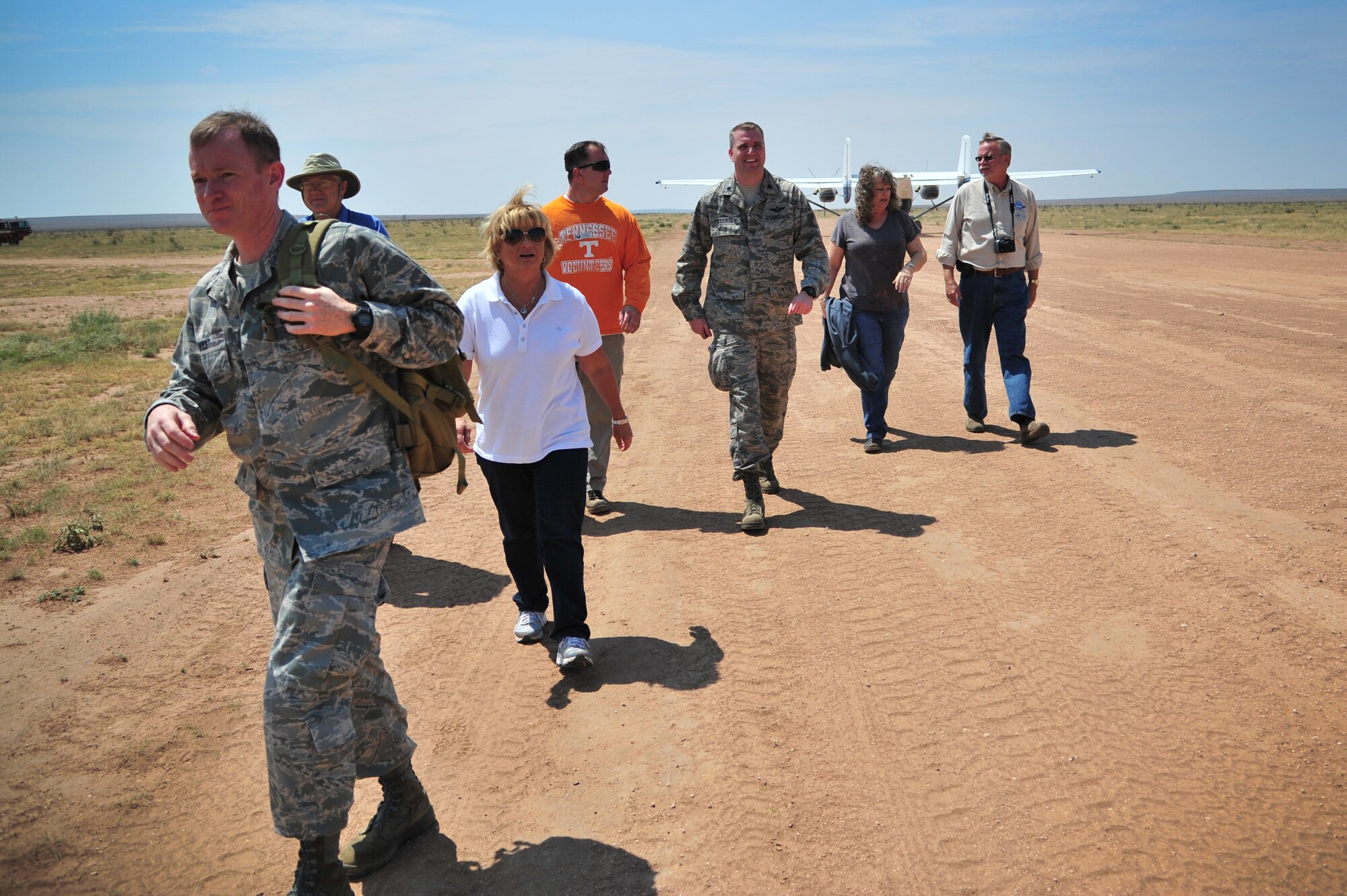 U.S. Air Force Col. William West, 27th Special Operations Group commander, and Lt. Col. Kenneth Pedersen, 551st Special Operations Squadron, lead Cannon's honorary commanders at the beginning of their tactical ground move at Melrose Air Force Range, N.M., Aug. 22, 2012. The 27th Special Operations Wing Honorary Command Program is geared toward fostering military pride and local support from a broad group of surrounding community ambassadors.  (U.S. Air Force photo/Airman 1st Class Alexxis Pons Abascal)  