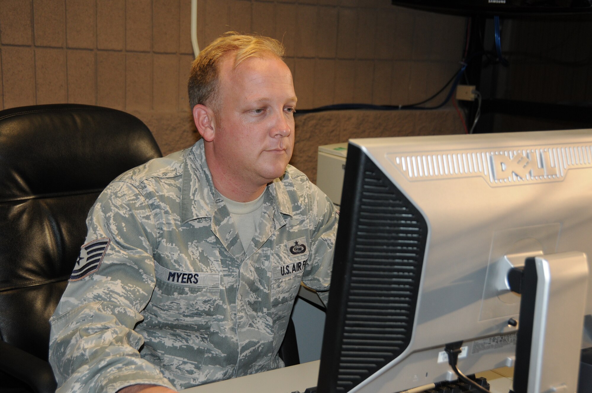 DAVIS-MONTHAN AIR FORCE BASE, Ariz. –  Tech. Sgt. John Myers, was an analyst participating in PANAMAX 2012 at Air Forces Southern, Aug. 6-17.  PANAMAX is an annual U.S. Southern Command-sponsored exercise that focuses on ensuring the defense of the Panama Canal.  During the exercise, forces from 17 nations worked together as part of a computer-simulated-exercise to provide a variety of responses to requests made by the governments of Panama and Colombia.  These requests were geared at protecting and guaranteeing safe passage of traffic through the Panama Canal, ensuring its neutrality, and respecting national sovereignty. (USAF photo by Tech. Sgt. Andria Sapp/Released).     