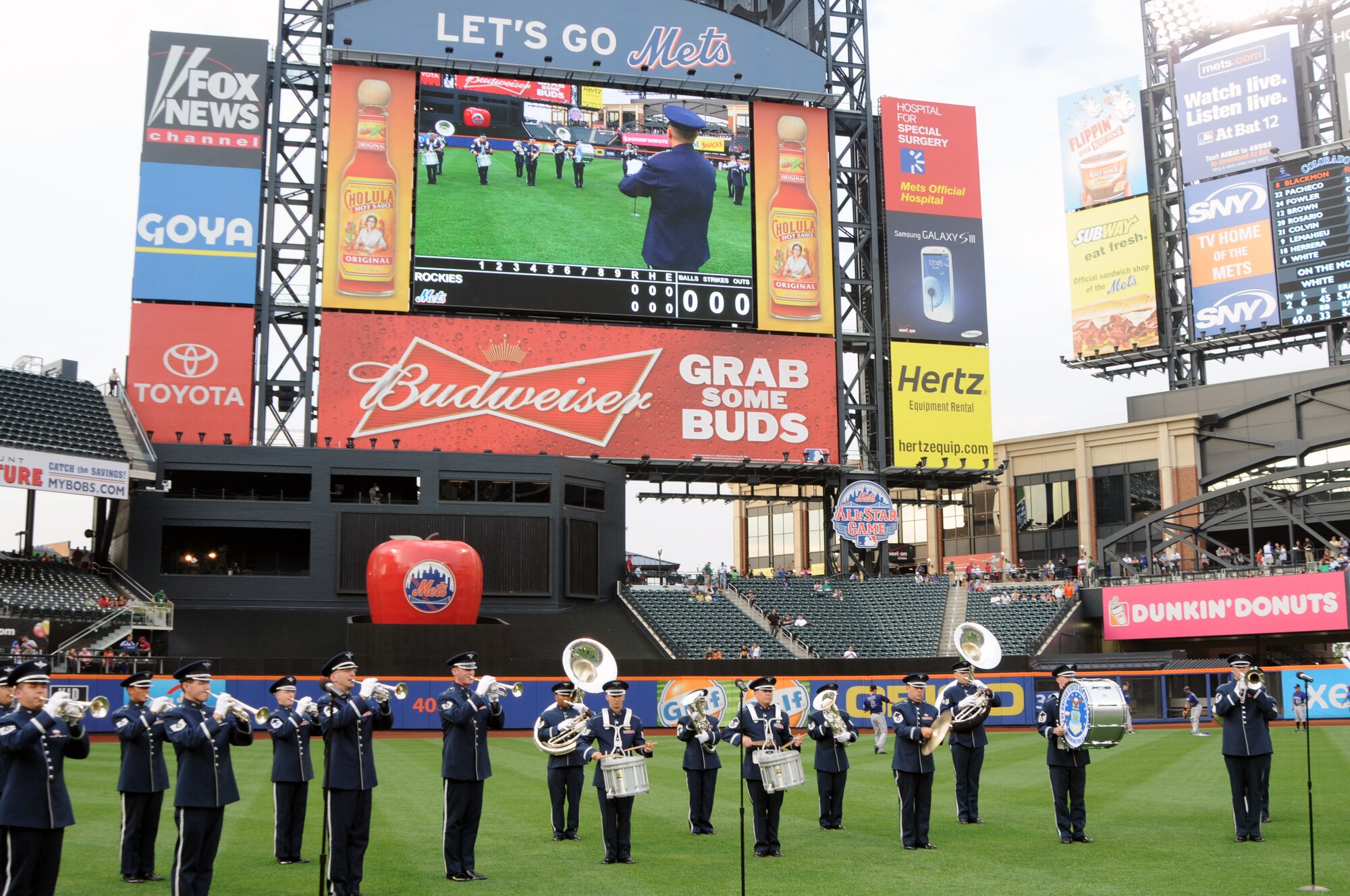 The U.S. Air Force Band opens for the New York Mets at Citi Field, Queens, N.Y., Aug. 20 during Air Force Week. Air Force Week is sponsored by the chief of staff of the Air Force to allow the communities to see what the Air Force does. (U.S. Air Force photo by Senior Airman Tabitha N. Haynes)               