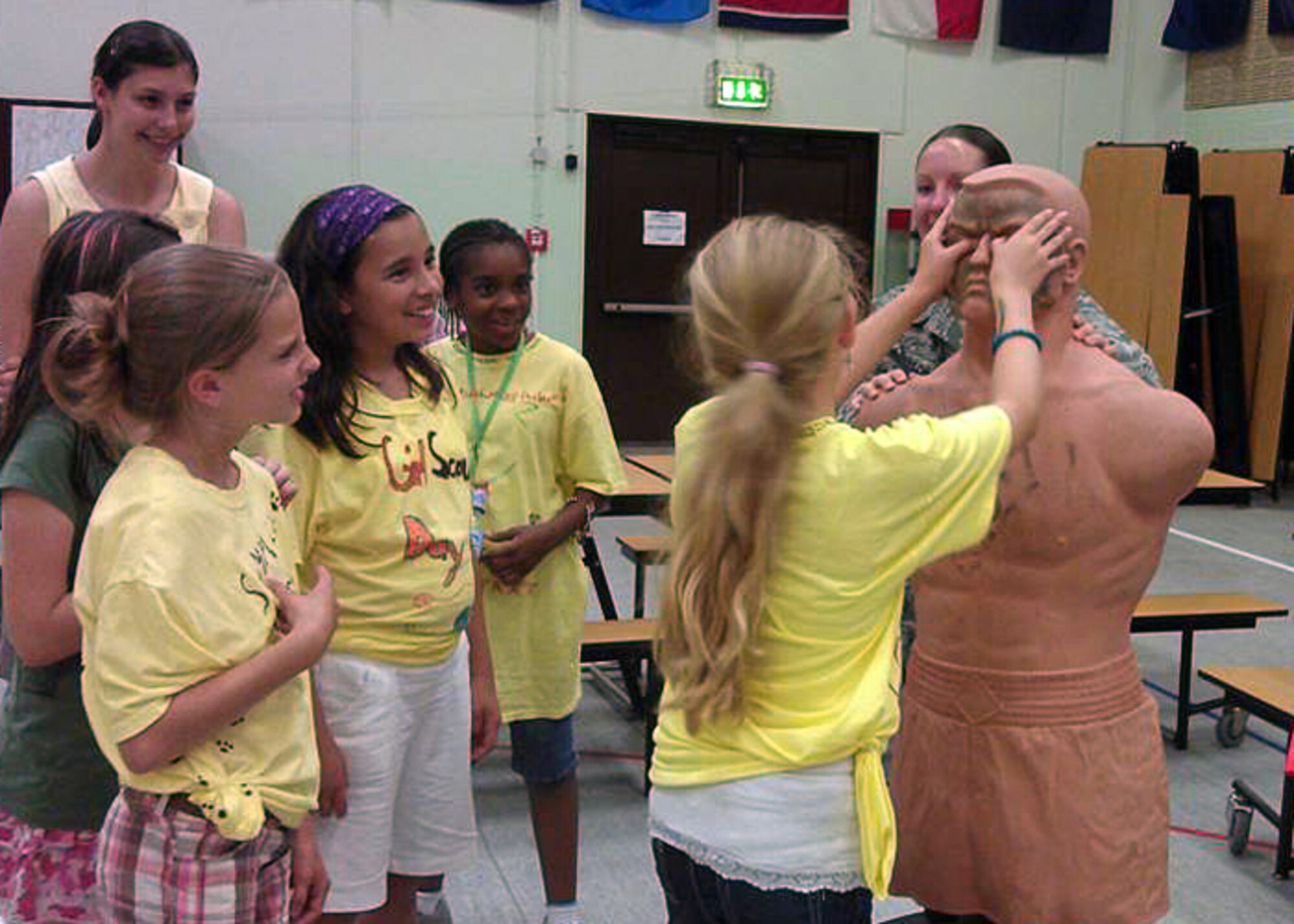 SPANGDAHLEM AIR BASE, Germany -- Capt. Julie Roloson, 52nd Security Forces Squadron, teaches pain compliance tactics to Girls Scouts from USA Girl Scouts Overseas at the Spangdahlem Elementary School here Aug. 21 during a summer camp. The Girl Scouts partnered with the 52nd SFS to learn techniques in identifying and reacting to strangers, basic defensive striking techniques, and strategies for getting attention during an emergency. (U.S. Air Force photo by Tech. Sgt. Jose De Jesus/Released)