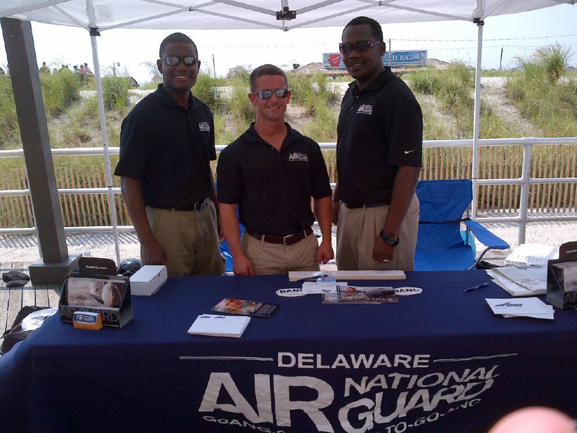 Delaware Air National Guard recruiters Senior Airman Desmond Overton, Tech. Sgt. Sam Lewis and Tech. Sgt. Terrence Parker at the 2012 Atlantic City Thunder over the Boardwalk Airshow on August 17, 2012. The event drew 800,000 visitors in 2011. (U.S. Air Force photo/Staff Sgt. Brian Janssens)