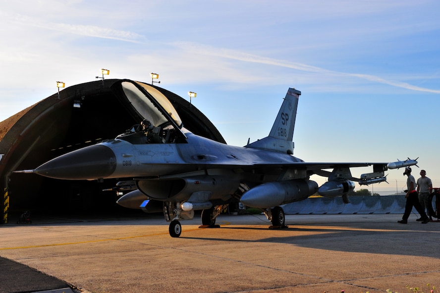 SPANGDAHLEM AIR BASE, Germany – Crew chiefs from the 480th Aircraft Maintenance Unit perform a pre-flight functions check on an F-16 Fighting Falcon on the flight line here Aug. 23 before the pilot departs for Nordic Air Meet 2012. The fighter squadron departed for the multi-national training exercise to share and exchange new combat tactics with allied countries. (U.S. Air Force photo by Airman 1st Class Dillon Davis/Released)