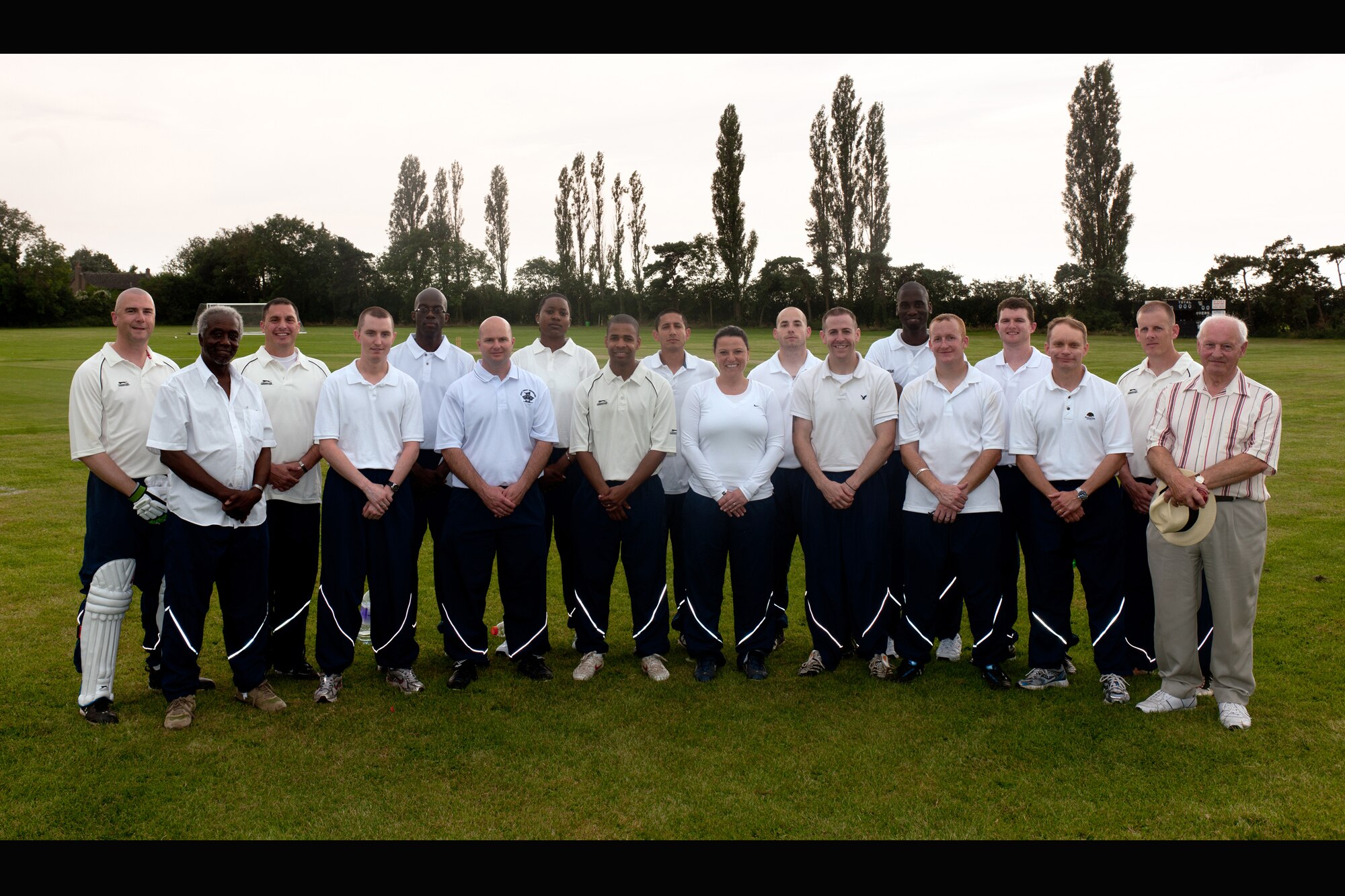 LONGSTANTON, United Kingdom – Members of the 423rd Air Base Group pose for their team picture between innings Aug. 19 at Longstanton Bowls Club in Longstanton, United Kingdom. This was the first ever cricket game the 423rd ABG has played. The team has practiced against themselves the last couple of months to prepare for the game. (U.S. Air Force photo by Master Sgt. John Barton)