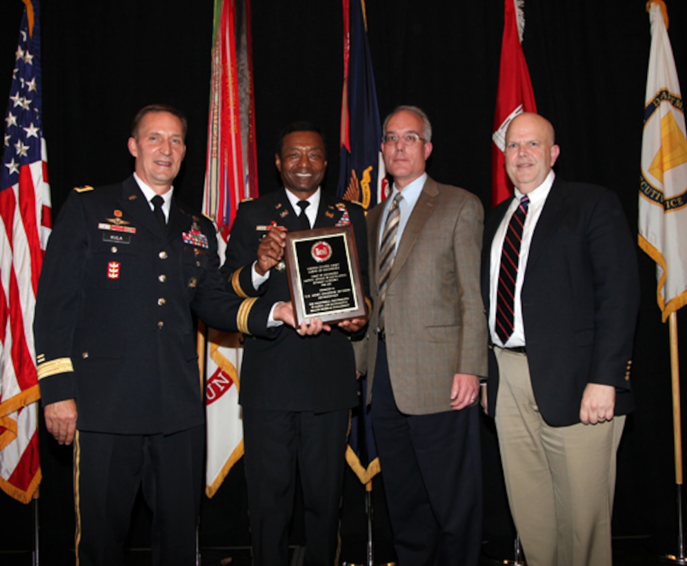 Lt.  Gen. Thomas P. Bostick, commanding general of the U.S. Army Corps of Engineers, presents the Chief of Engineers Safety Performance Award of Excellence (Division Category) to the  Southwestern Division.  