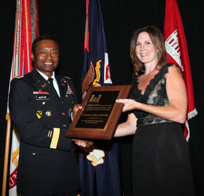 Lt. Gen. Thomas P. Bostick, left, commanding general of the U.S. Army Corps of Engineers, presents the Corps of Engineers Landscape Architect of the Year: Dr. Rumanda K. Young, RLA, Forth Worth District


