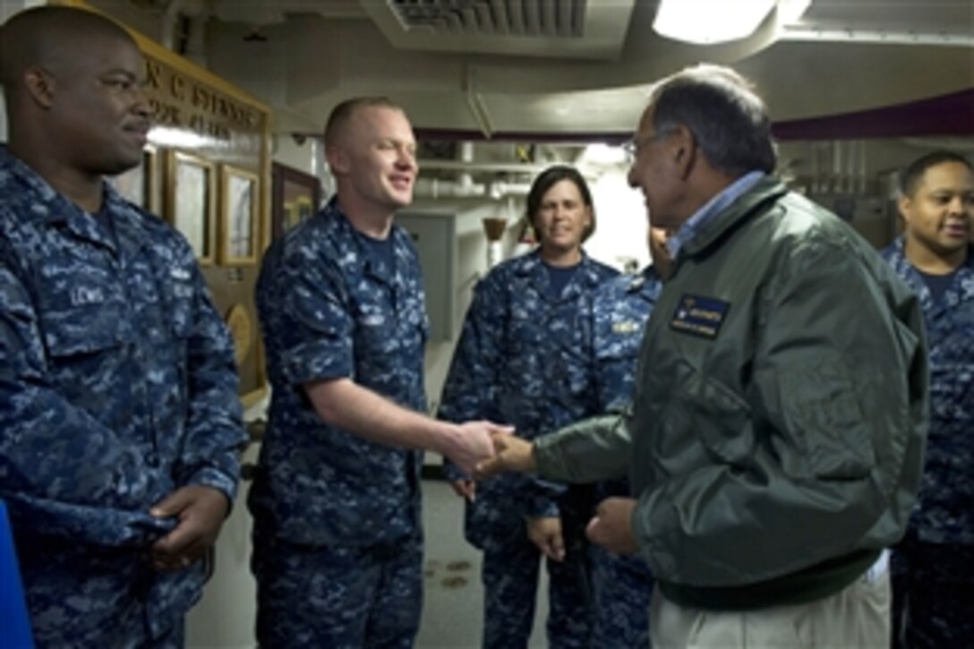 Defense Secretary Leon E. Panetta greets sailors aboard the aircraft carrier USS John C. Stennis in Bremerton, Wash., Aug. 22, 2012.
