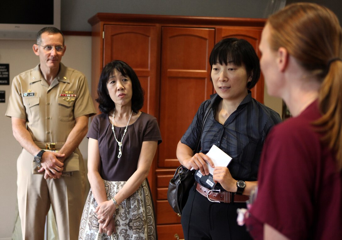 Toshiko Iwasaki (second to left), wife of the Chief of Staff for Japan’s Self-Defense Forces Gen. Shigeru Iwasaki, tours one of the nursing rooms at Naval Hospital Camp Lejeune aboard Marine Corps Base Camp Lejeune Aug. 21. Navy Capt. David Lane, commanding officer of NHCL, showed Iwasaki around the hospital during her visit to NHCL.