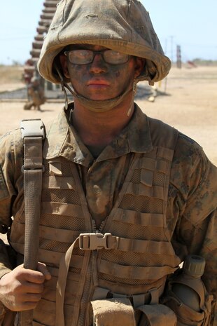 Pvt. Zachery T. Douthitt, Platoon 3242, Co. L, takes a moment before finishing an obstacle course during the crucible aboard Marine Corps Base Camp Pendleton Aug.14. Douthitt is a 20-year-old Muncie, Ind. native who entered recruit training with the goal of earning a leadership position. Although Douthit did not reach his goal in recruit training he said he will continue to work for a leadership billet in the Marine Corps.