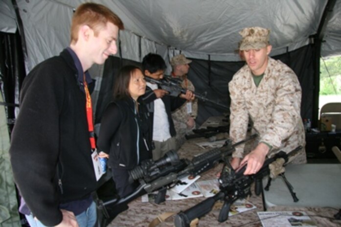 Capt. Leon providing information on weapons