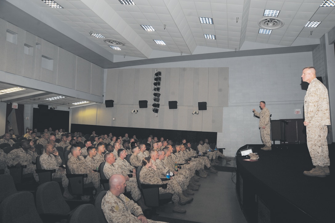 Col. Don Davis, commanding officer, and Sgt. Maj. Conrad Potts, both with Marine Corps Logistics Base Albany, guide Marines through an open discussion on ethics at the Base Theater, Friday. “What is important is that we continue to have a discussion about ethical behavior. Our leaders should be reinforcing this, and we as Marines, should be reinforcing this among ourselves,” Davis said.
