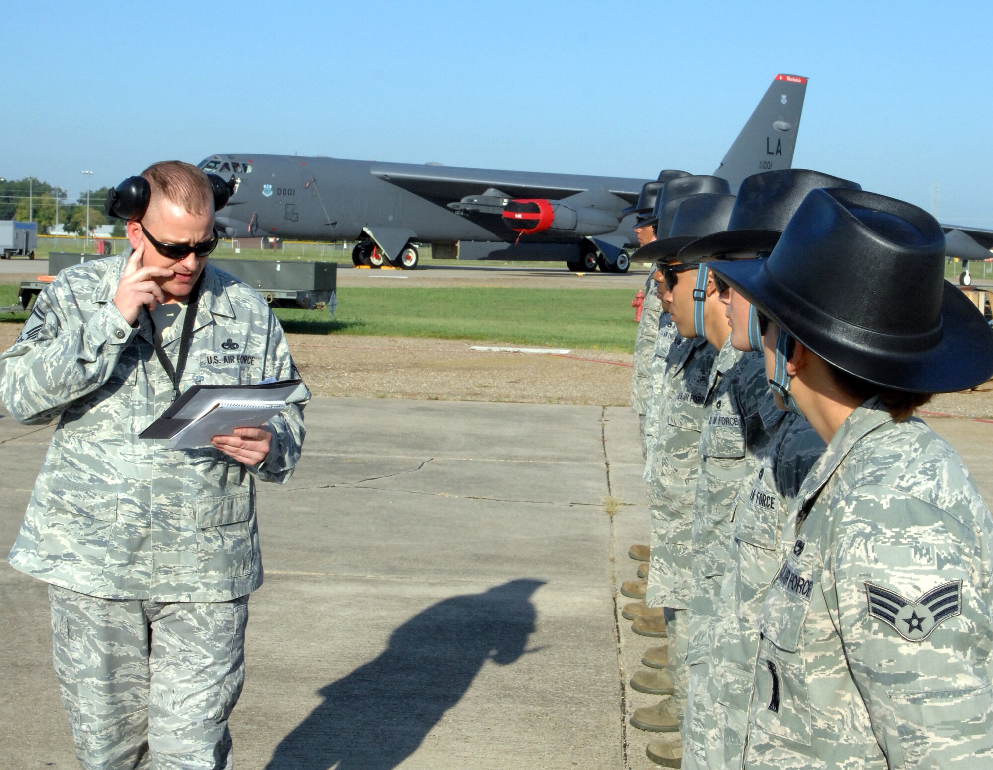 Senior Master Sgt. Patrick VanVranken, 2nd Munitions Squadron, reads the rules of engagement for the upcoming 2012 Global Strike Challenge to the munitions maintenance team on Barksdale Air Force Base, La., Aug 20. The 11-person team will compete against the other bases within Air Force Global Strike Command to defend Barksdale's title of the best munitions maintenance team in AFGSC. (U.S. Air Force photo/Staff Sgt. Jason McCasland)(RELEASED)