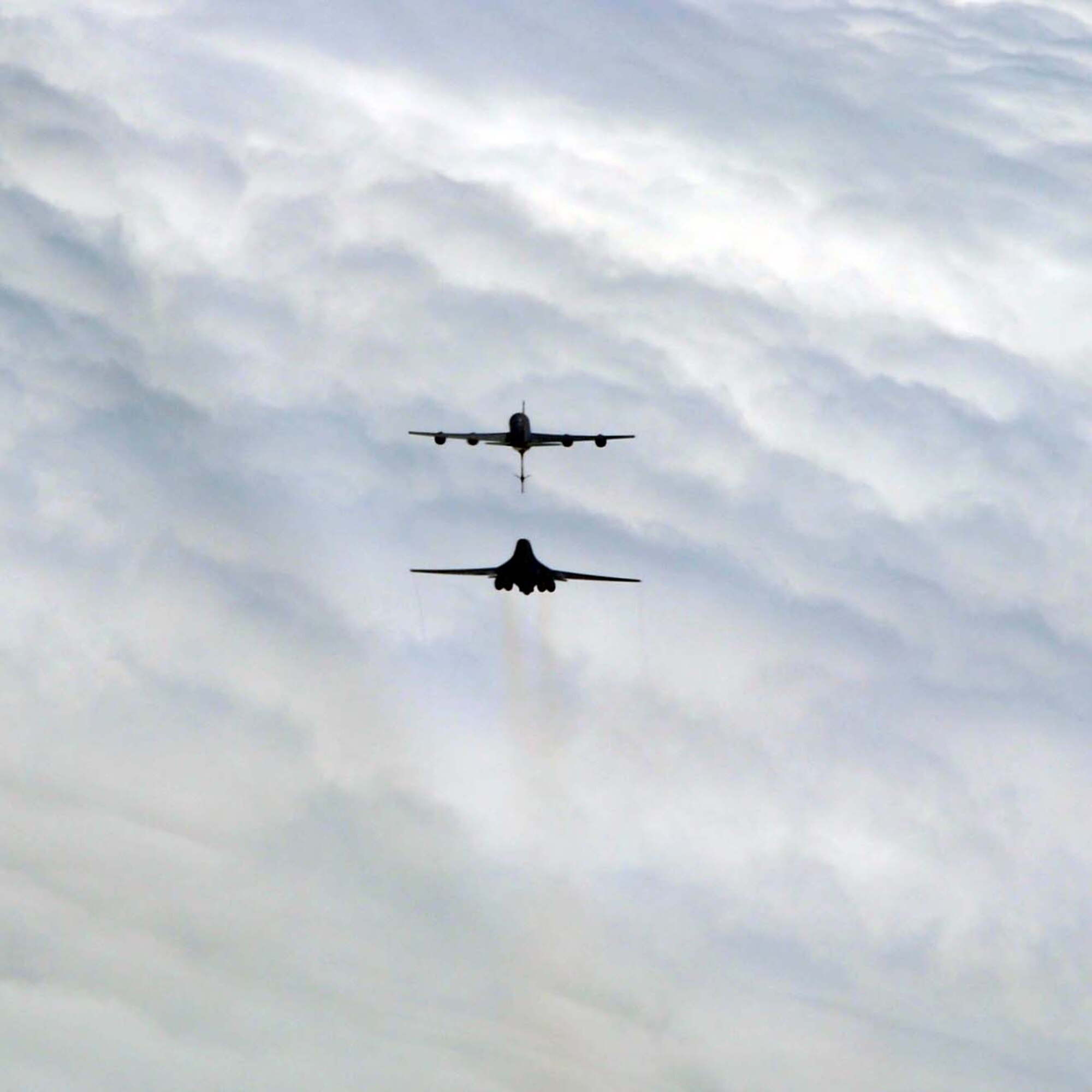A B1-B Lancer from the 7th Bomb Wing, Dyess Air Force Base, Texas, closes in on a KC-135 Stratotanker from McConnell Air Force Base, Kan., during an air refueling mission, Aug. 23, 2012.  The KC-135 featured a total force aircrew made up of members of the Air Force Reserve 931st Air Refueling Group and the active duty 22nd Air Refueling Wing.  Several congressional staff members were onboard the tanker, participating in an orientation flight to learn more about the Air Force Reserve, the air refueling mission, and the Total Force Integration initiatives in place at McConnell.  The KC-135 provides the core aerial refueling capability for the U.S. Air Force, and has been performing in this role for more than 50 years. (U.S. Air Force photo by 1st Lt. Zach Anderson)