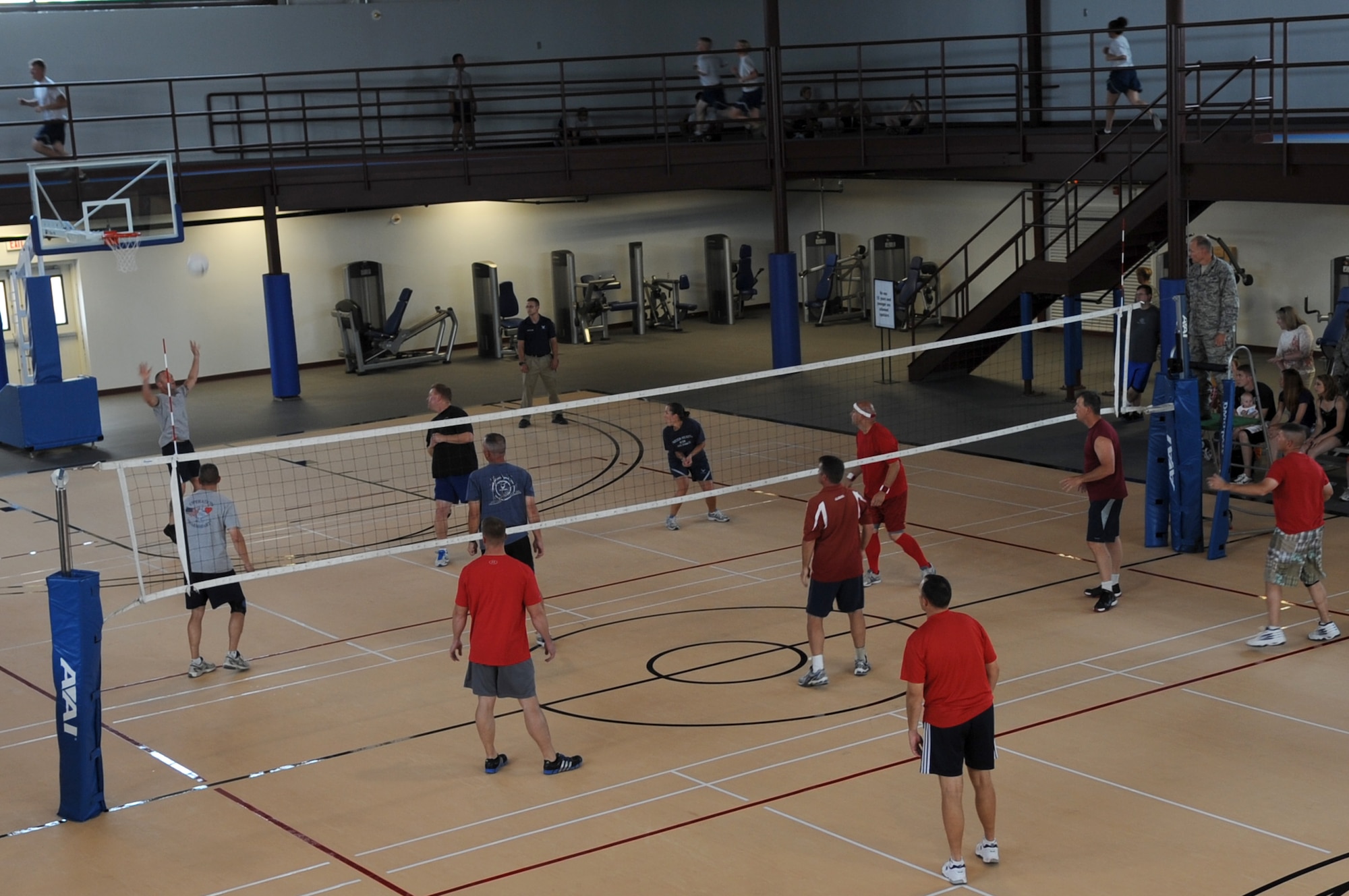 Commanders and first sergeants from the 366th Fighter Wing play the first volleyball game inside the newly remodeled Fitness Center Annex Aug. 15, 2012 at Mountain Home Air Force Base, Idaho. Gunfighters can use this facility if the weather outside falls below 20 degrees or rises 90 degrees and wind speed over 13 knots.   (U.S. Air Force photo/Staff Sgt. Roy Lynch)