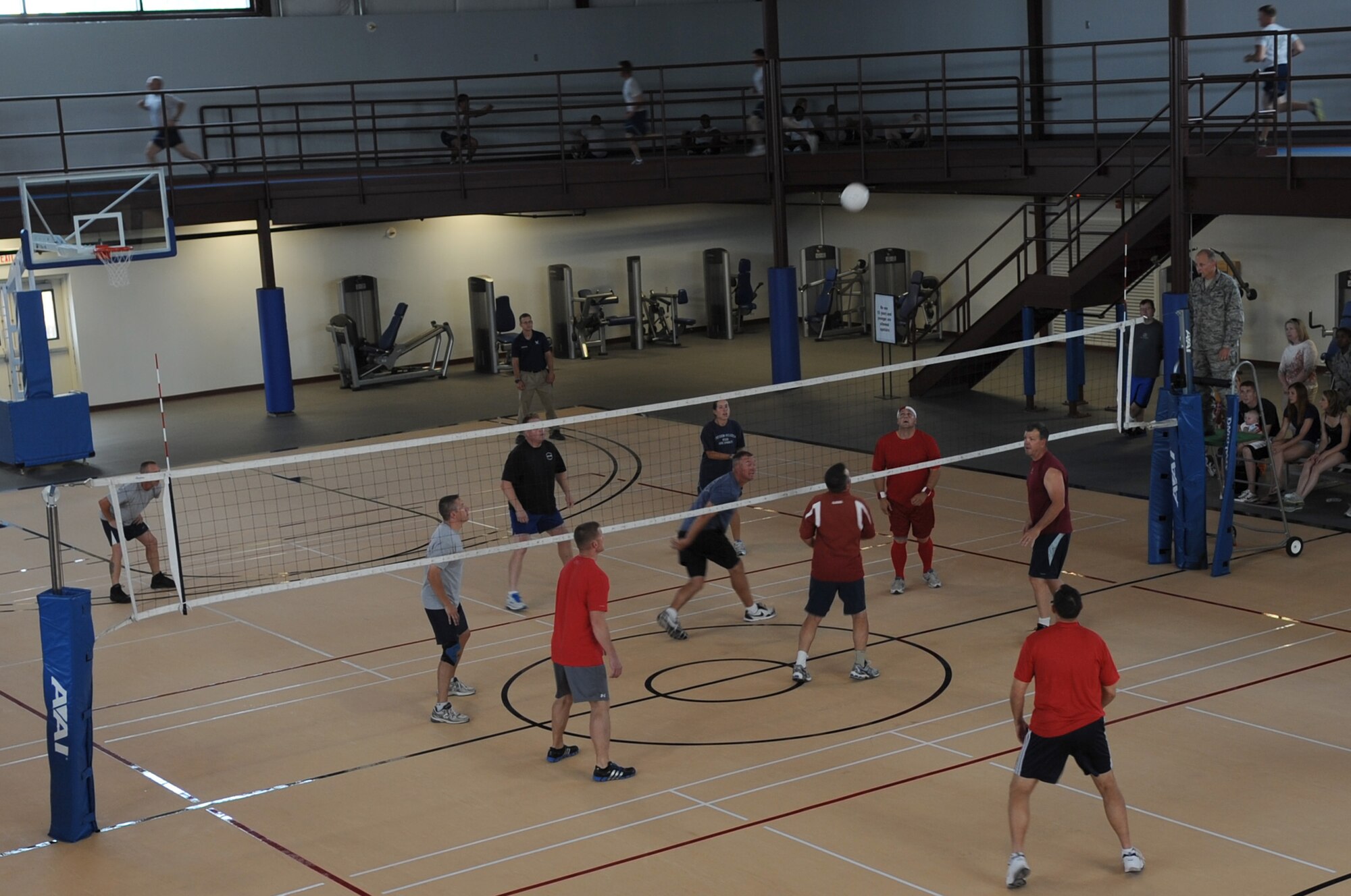 Commanders and first sergeants from the 366th Fighter Wing play the first volleyball game inside the newly remodeled Fitness Center Annex Aug. 15, 2012 at Mountain Home Air Force Base, Idaho. The sergeants commanded the colonels and won two out of three games. (U.S. Air Force photo/Staff Sgt. Roy Lynch)