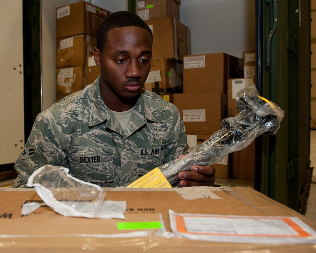 Airman 1st Class Marshall Dexter, 28th Logistics Readiness Squadron aircraft parts technician, inspects a label on the box of an aircraft part from a mobility readiness spares package at the Aircraft Parts Store on Ellsworth Air Force Base, S.D., Aug. 23, 2012. The shop has several MRSPs on hand that include a variety of B-1 parts to ensure maintainers are able to prepare aircraft for taskings anywhere around the world. (U.S. Air Force photo by Airman 1st Class Kate Thornton-Maurer/Released)