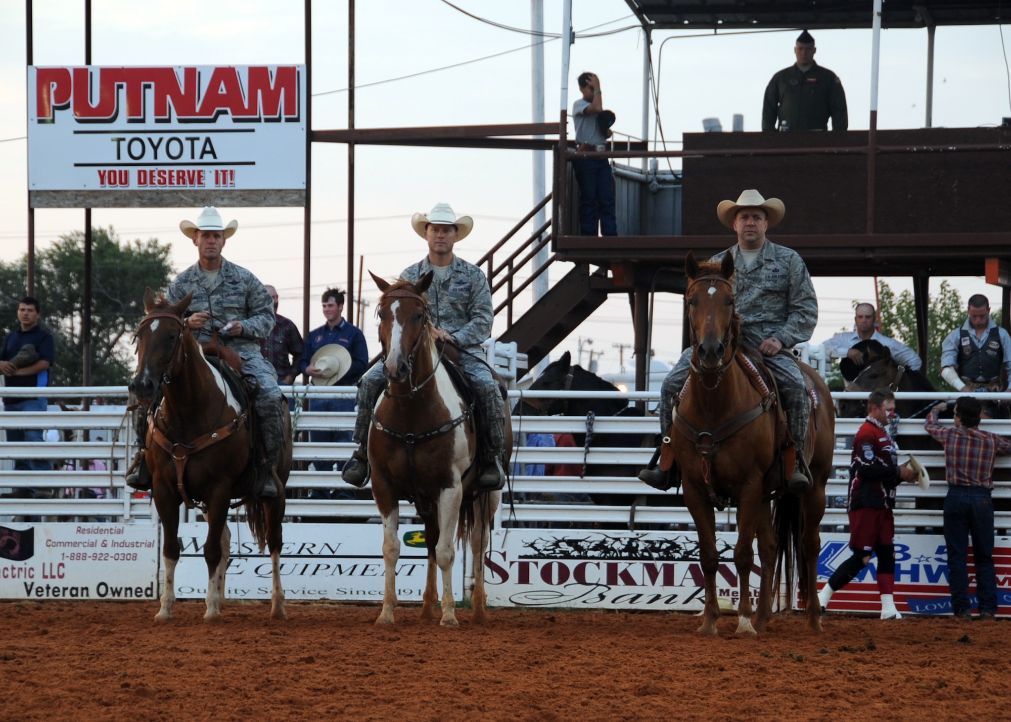 ALTUS, Okla. – Col. Anthony B. Krawietz, 97th Air Mobility Wing commander, Col. Casey D. Eaton, 97th AMW vice commander and Chief Master Sgt. David A. Fish, 97th AMW command chief, are recognized at the Great Plains Stampede Rodeo, Aug. 23, 2012. The military affairs committee honored military members and their families during the first night of rodeo to show appreciation for those defending our nation. (U.S. Air Force photo by Airman 1st Class Franklin R. Ramos / 97th Air Mobility Wing / Released)