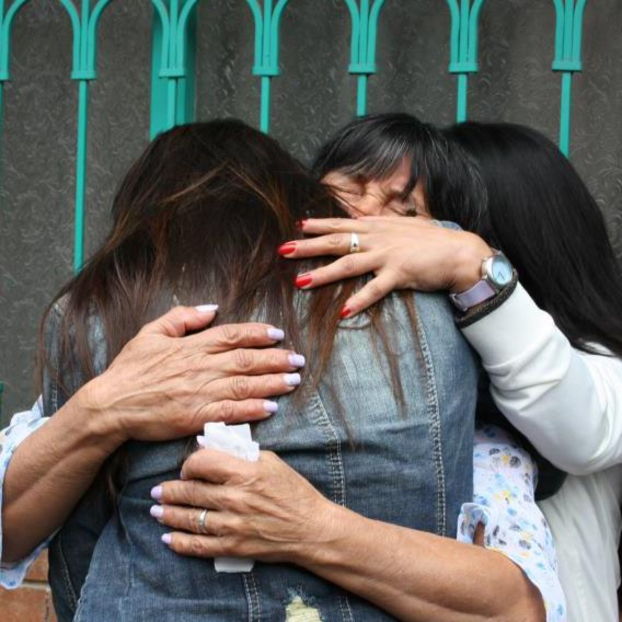 Master Sgt. Culverhouse is reunited with her mother and her sister recently in Bogota, Colombia. Culverhouse, 60th Medical Support Squadron element chief, was kidnapped as a child and adopted by an American family. She had not seen her birth family since she was a little girl.