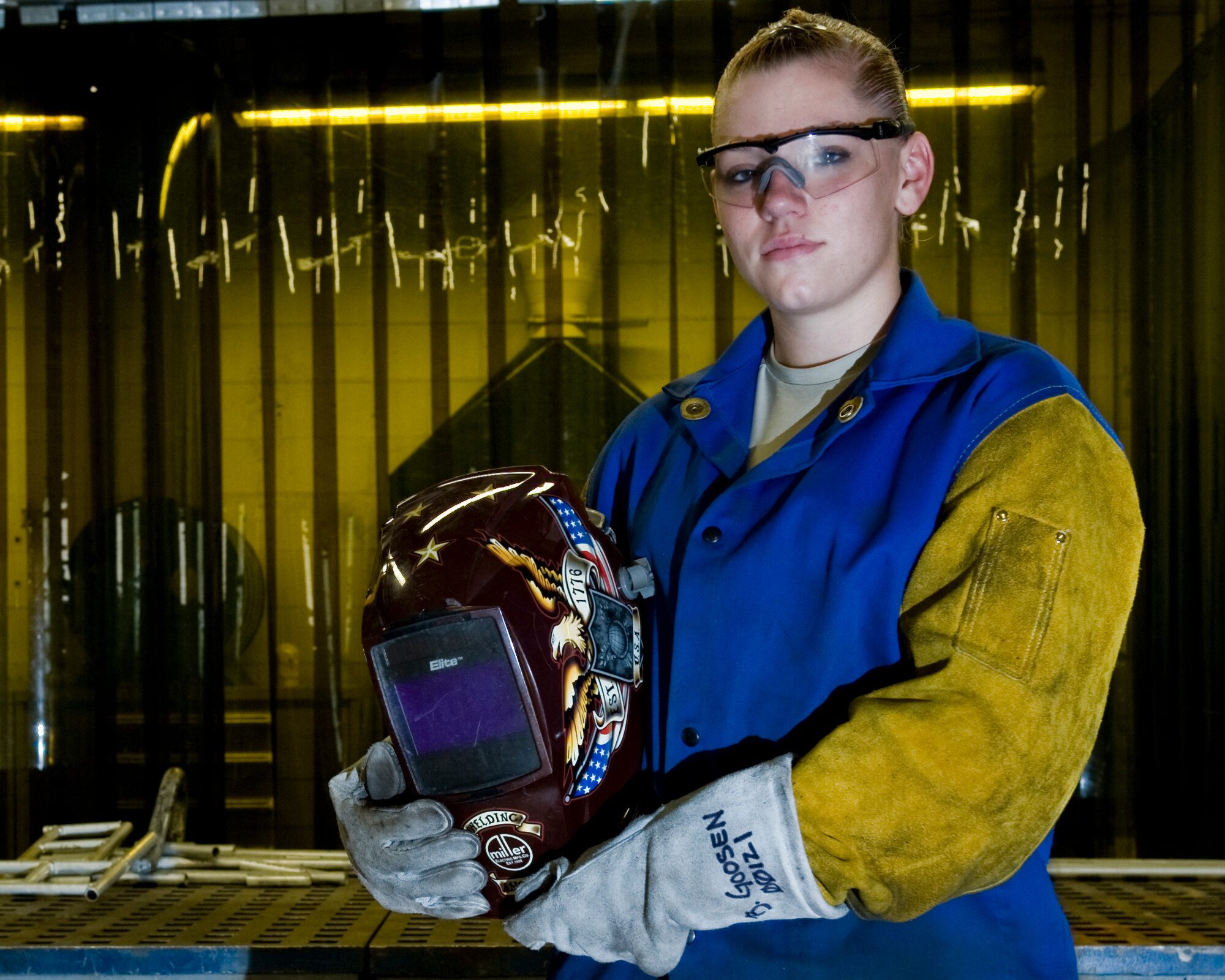 Airman 1st Class Brooke Goose poses for a photo Aug. 24, 2012, at Dyess Air Force Base, Texas. Goosen is with the 7thEquipment Maintenance Squadron and the only female out of 28 Airmen in the Dyess metal shop. She has more than seven years experience with welding.  ,(U.S. Air Force photo by Airman 1st Class Jonathan Stefanko)