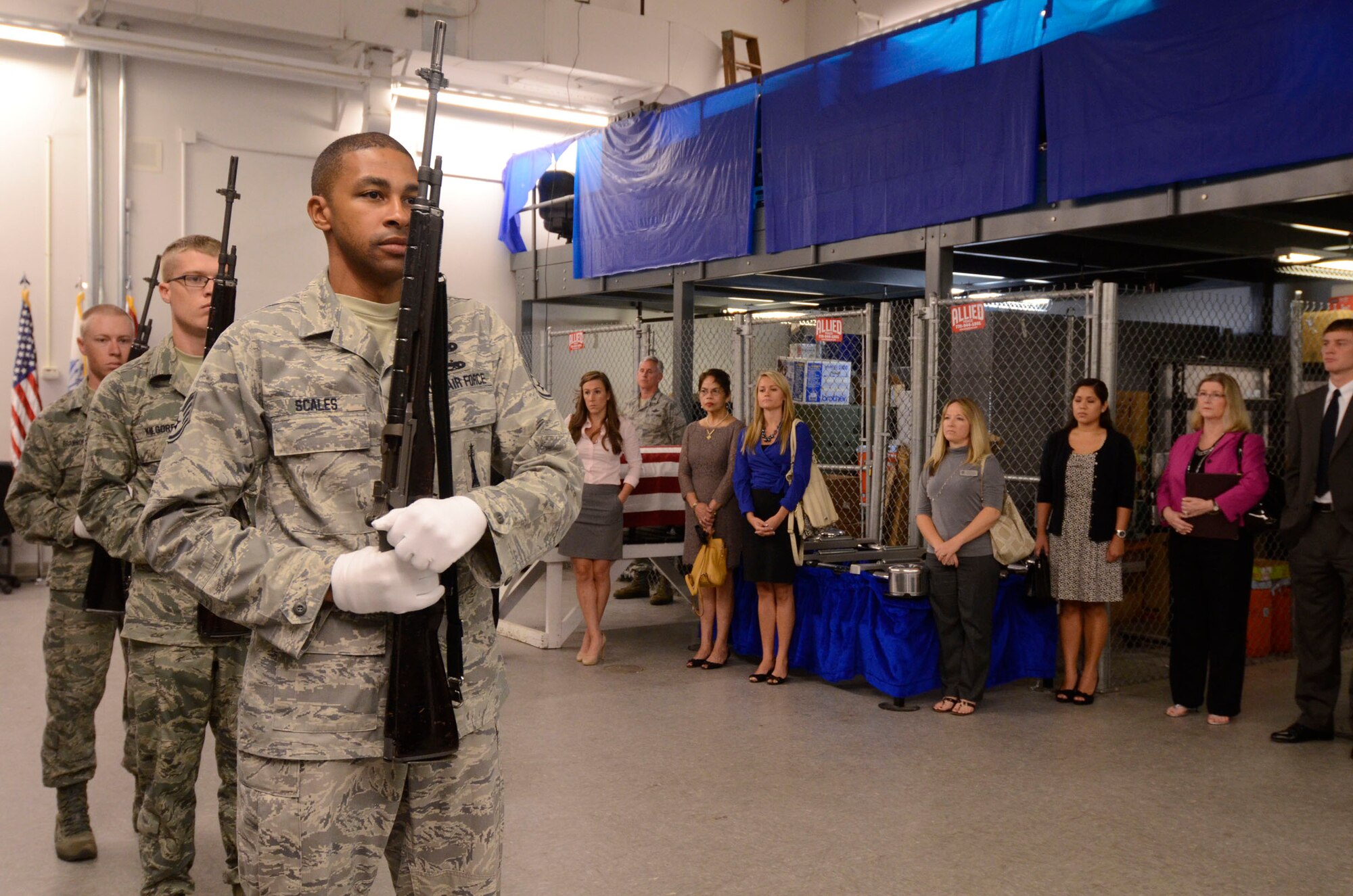 Members of the 94th Airlift Wing Honor Guard perform a mock firing party demonstration for visiting Congressional Staffers Aug. 23. (U.S. Air Force photo/Don Peek)