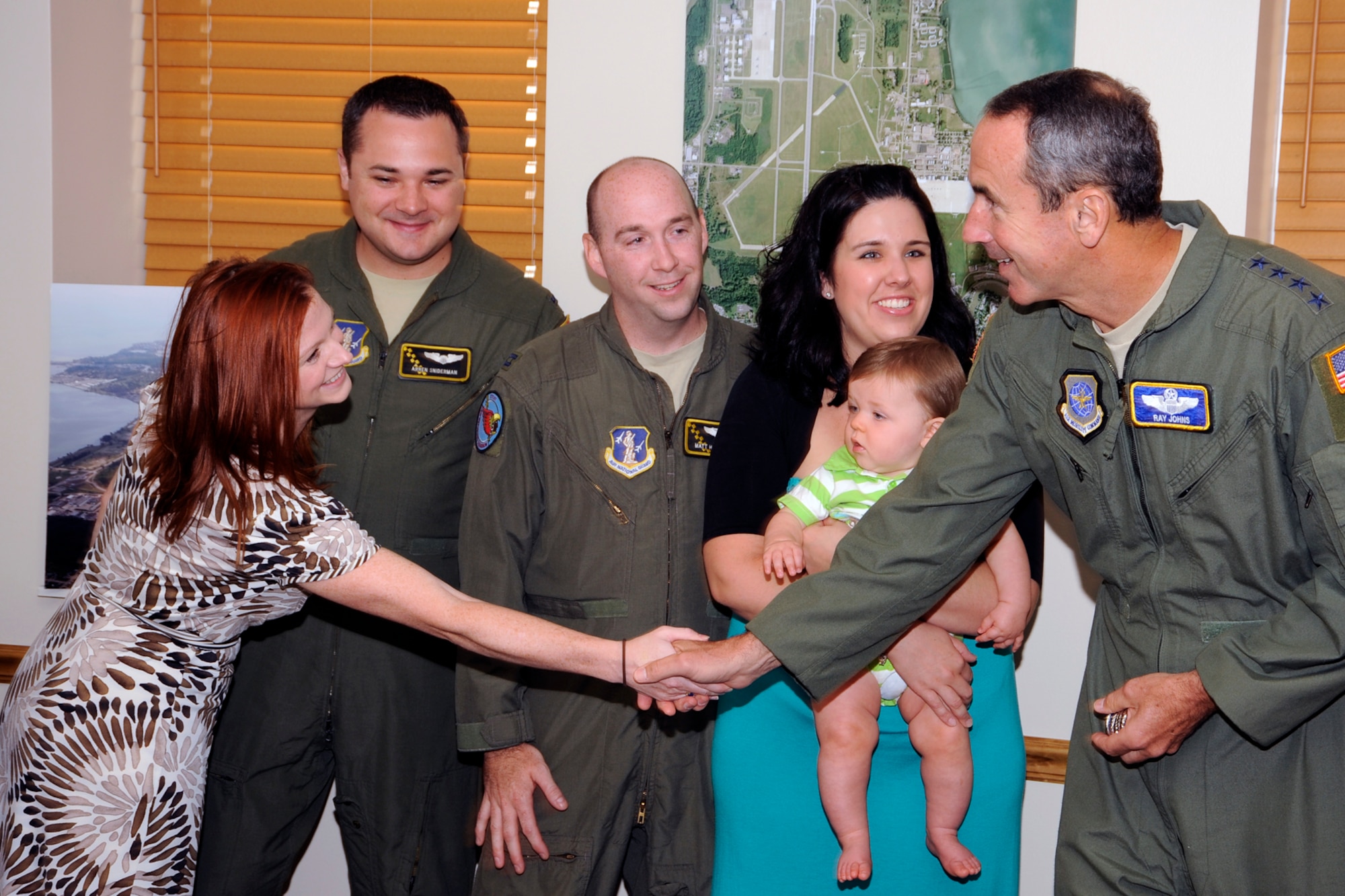 During Gen. Johns' visit to Selfridge Air National Guard Base Aug. 23-24, 2012, he had the opportunity to recognize a few 127th Wing Airmen for their significant contributions to Air Mobility Command missions.  One group lauded was the crew of "Elite 51" who, after refueling an F-18 over Southwest Asia, escorted the jet to safety after it lost operation of one of its engines.  General Johns also thanked the Airmen's families for their continuous support of the Air Force.  (Air National Guard photo by John S. Swanson)
