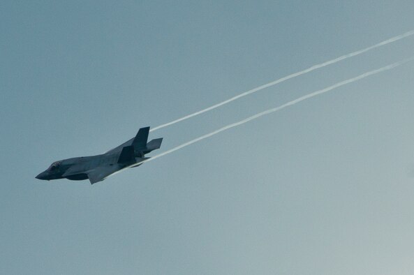An F-35 Lightning II joint strike fighter streaks across the sky over Eglin Air Force Base, Fla., Aug. 22.  The aircraft performed three approaches to the runway before returning to the 33rd Fighter Wing.  (U.S. Air Force photo/Samuel King Jr.)