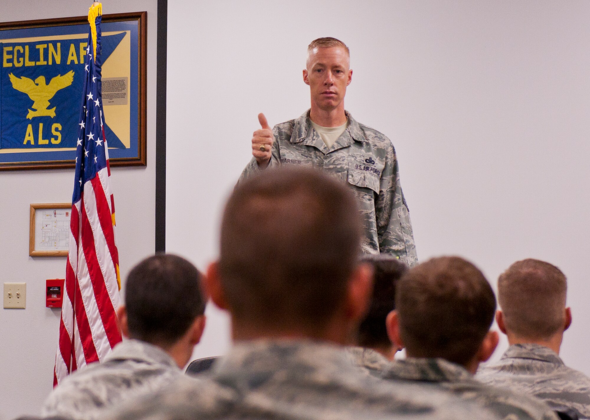 Chief Master Sgt. Michael Warner, the Air Force Materiel Command command chief, talks to Airmen attending Airman Leadership School at Eglin Air Force Base, Fla., Aug. 24.  The new chief spoke with Airmen in both ALS and the First Term Airmen’s Center during this two-day immersion tour of the base.  (U.S. Air Force photo/Samuel King Jr.)  