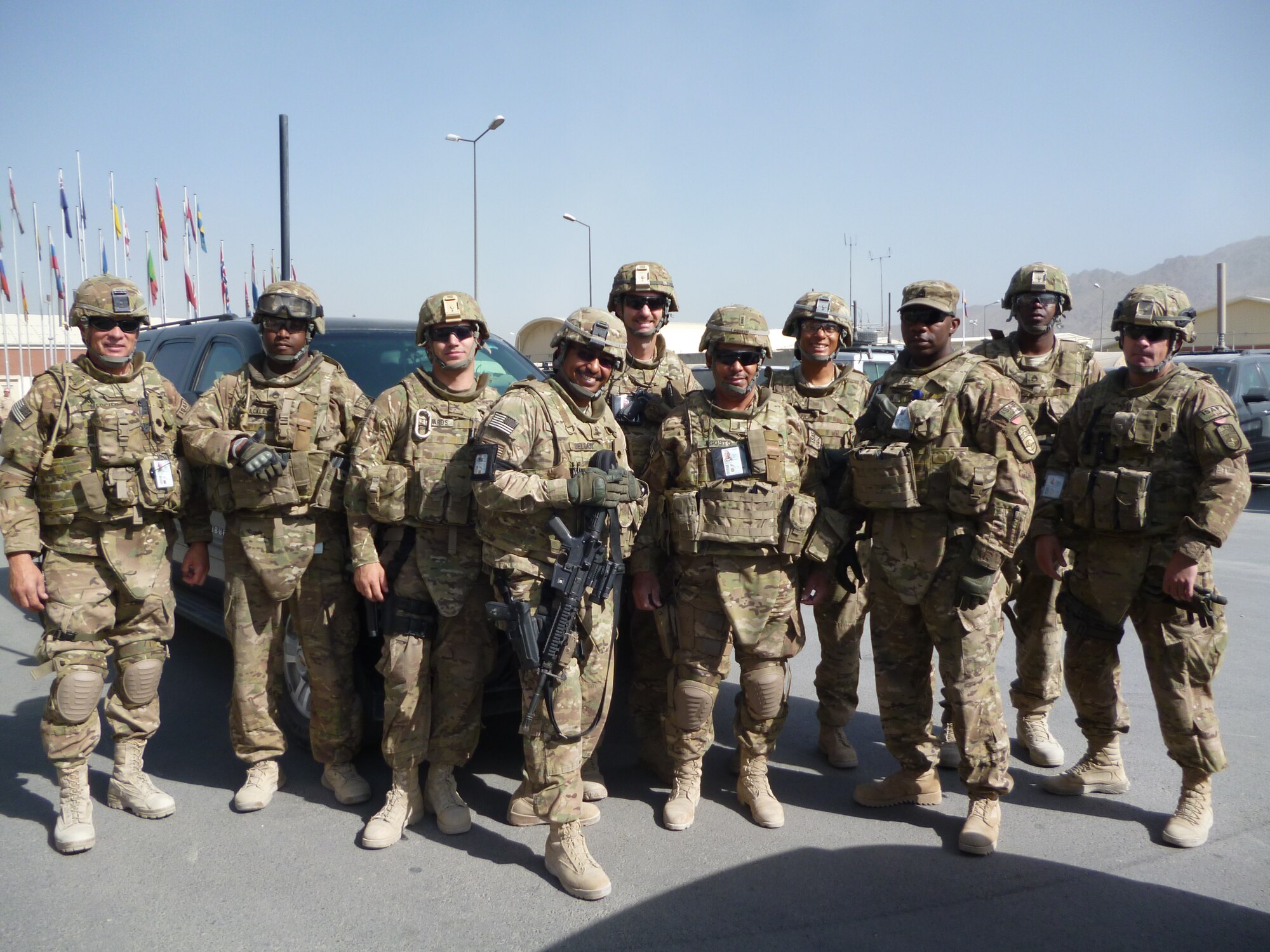 Master Sgt. Shawntell Miller, 309th Aircraft Maintenance Unit Supply section NCO-in-charge, fourth from the right, poses with the team she is deployed with in Kabul, Afghanistan, as a logistics combat advisor.  (Courtesy photo)