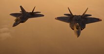 F-22 Raptors from Tyndall Air Force Base, Fla., fly in formation behind a KC-135 Stratotanker from Altus Air Force Base, Okla., after an air refueling Aug. 21, 2012.The F-22s were refueled outside of New York in support of the Brooklyn Cyclone flyover during Air Force Week. (U.S. Air Force photo/Airman 1st Class Kenneth W. Norman)

