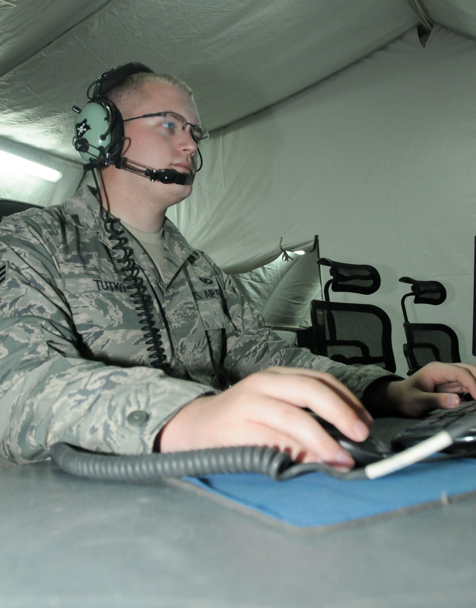 SOUTHWEST ASIA - U.S. Air Force Senior Airman Michael Tutko, 727th Expeditionary Air Control Squadron surveillance technician, monitors the air space to identify aircraft in the region Aug. 22, 2012. Tutko is an Ellington, Conn., native and is deployed from the Connecticut Air National Guard's 103rd Air Control Squadron. (U.S. Air Force photo/Tech. Sgt. Amanda Savannah)