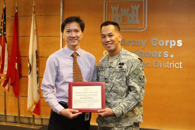 Col. Mark Toy, the Los Angeles District commander, presented Dr. Wen Chang with a command coin and a certificate which read in part, the District’s appreciation for Chang’s “outstanding leadership, dedication and technical expertise for the Asset Management, the Programs and Project Management, and the Planning Divisions and in the development of the FY14 Watershed-Based Budget Pilot Proposal for the Santa Ana River Watershed. Dr. Chang currently provides technical and budgeting support within the Natural Resources Management Program. His national perspective in all of these areas has been an invaluable asset to the District.” 