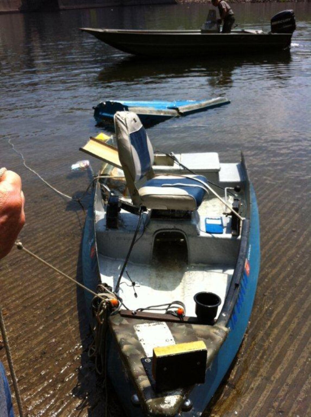 LANCASTER, Tenn. — This fishing boat capsized in the tailwater of Center Hill Dam Aug. 16, 2012 during sluice gate releases. Two people were rescued thanks to quick-thinking, experience and teamwork between the U.S. Army Corps of Engineers Nashville District officials and a nearby fisherman.


