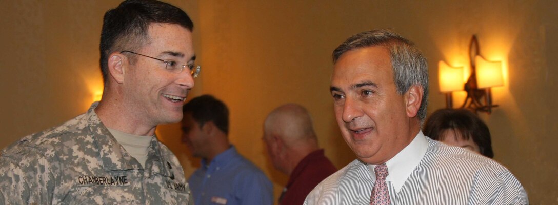 Lt. Col. Chamberlayne talks with Jim Newsome, CEO of the South Carolina State Ports Authority.
