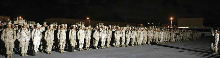 Marines and sailors of Combat Logistics Battalion 4 prepare to be dismissed to their families and friends at Camp Foster Aug. 19. The battalion was deployed in Helmand province, Afghanistan, for seven months in support of Operation Enduring Freedom. CLB-4 is a part of Combat Logistics Regiment 3, 3rd Marine Logistics Group, III Marine Expeditionary Force.