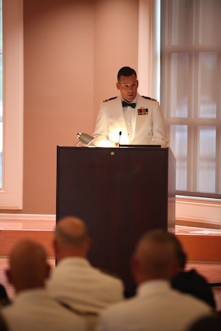 Lt. Cmdr. John J. Neal, a dental officer with 2nd Dental Battalion, 2nd Marine Logistics Group, speaks to the audience during the celebration of the 100th anniversary of the Navy’s Dental Corps aboard Camp Lejeune, N.C., Aug. 18, 2012. Neal explained the history of the Dental Corps starting from when it was first formed in 1912.