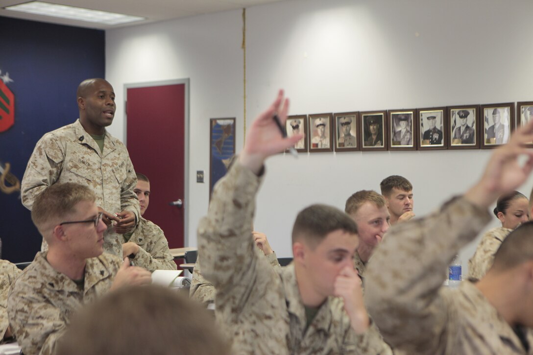 Gunnery Sgt. Valdez R. Baker, staff non commissioned officer in charge for Cherry Point Corporals Leadership Course, teaches a history of the NCO class at the Training and Education Center, Aug. 16. "We are directly responsible for shaping the ideas they have," said Baker about his responsibilities to the corporals that come through his course. "Going to basic training, (Marine Combat Training), (military occupations skills) school, that’s just the foundation."