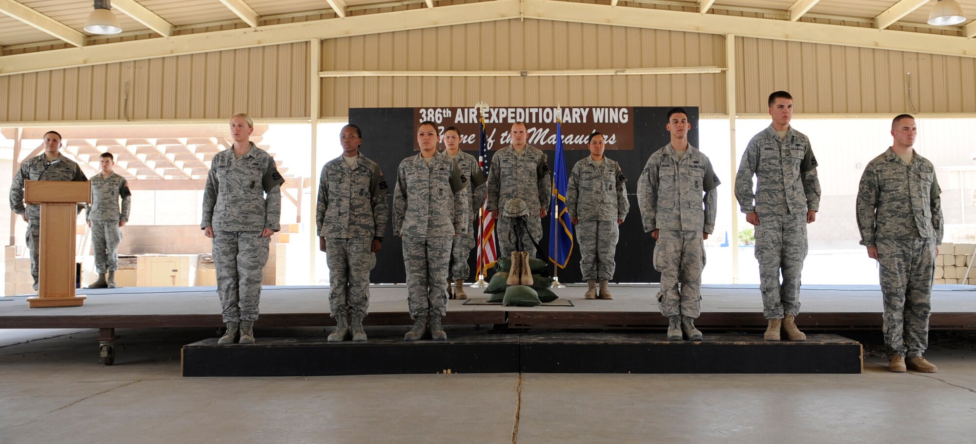 SOUTHWEST ASIA – The 386th Expeditionary Security Forces Squadron honored the nine Airmen who gave their lives during Operation Iraqi Freedom at the Fallen Defender Memorial Service here Aug. 25. (U.S. Air Force photo/Staff Sgt. Alexandra M. Boutte)