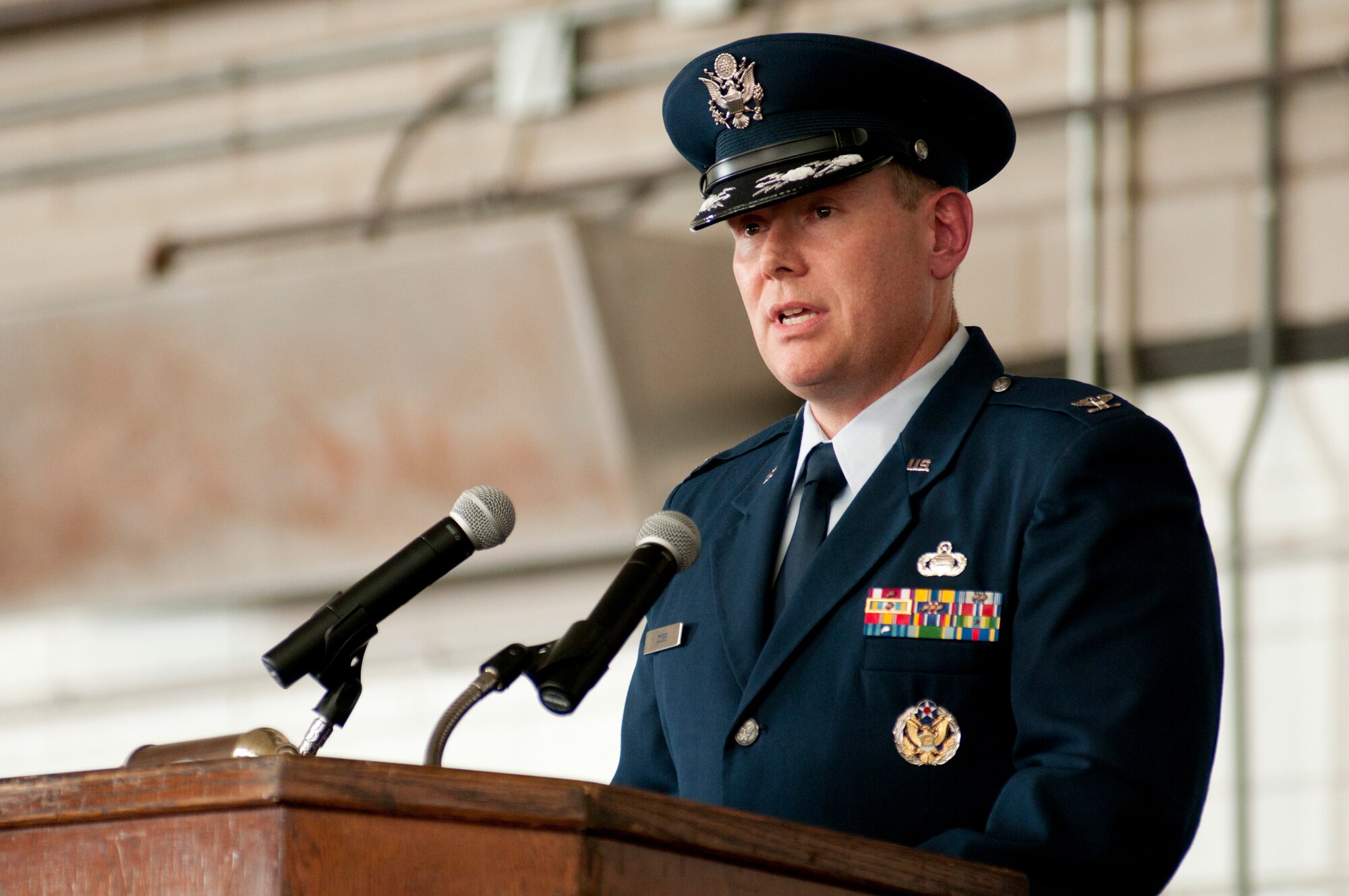 Col. Patrick J. Cobb, 102nd Intelligence Wing Commander, addresses Wing members and guests after formally assuming command at Otis Air National Guard Base, Aug. 25, 2012. (Air National Guard Photo by Senior Airman Jeremy Bowcock/Released)