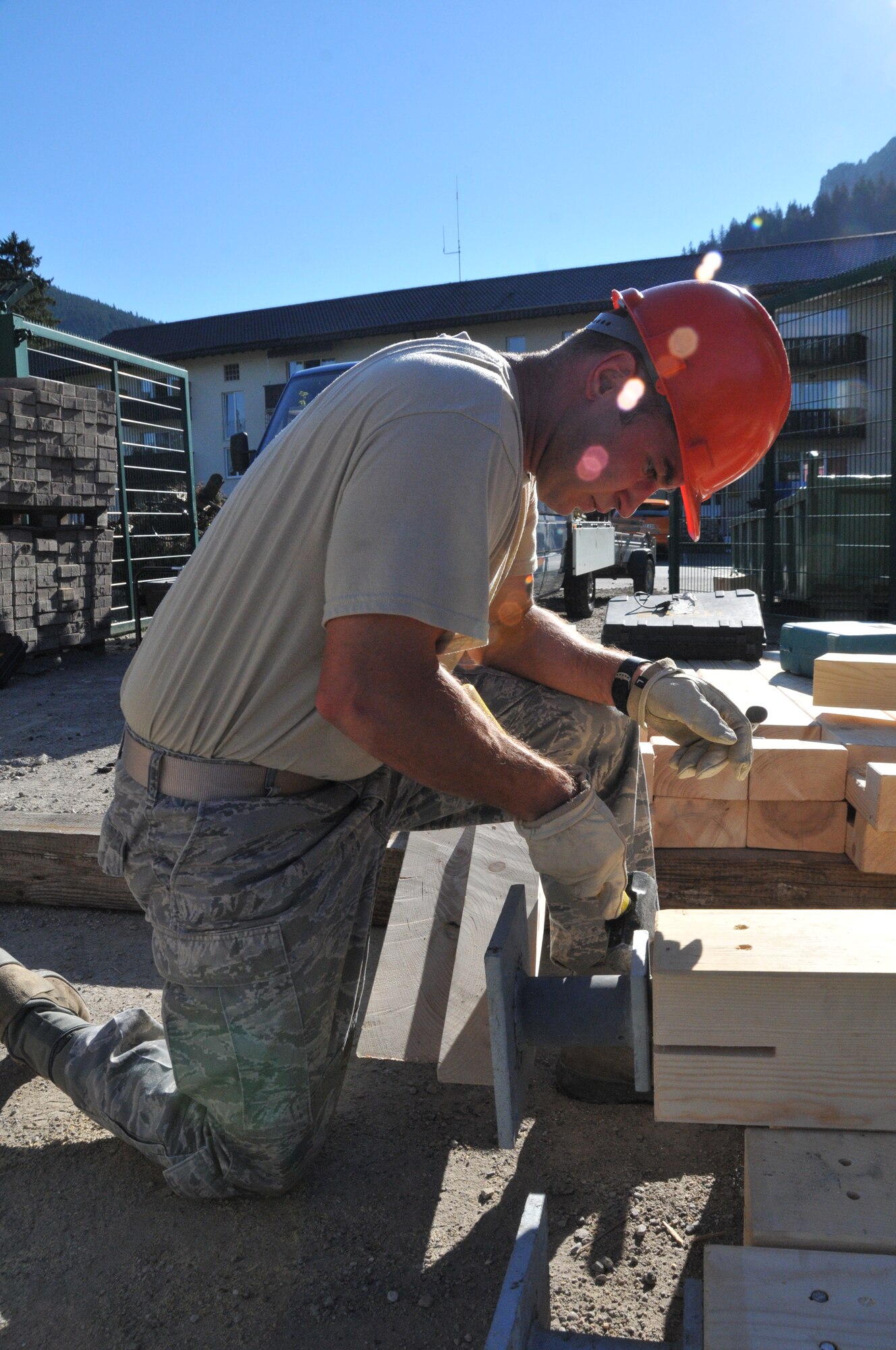 Wyoming Air National Guard’s Tech. Sgt. James Brown, 153rd Civil Engineer Squadron, prepares beams for a car port structure at the NATO School recreation center Aug. 20, 2012, Oberammergau, Germany.  Airmen from the 153rd CES are putting their skills to work as they conduct their annual training. (U.S. Air Force photo by Staff Sgt. Natalie Stanley)