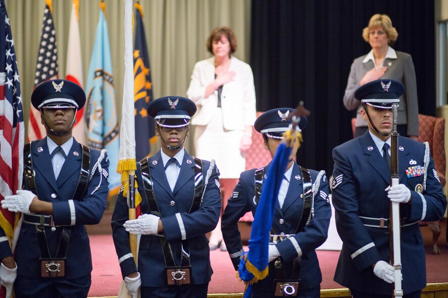 YOKOTA AIR BASE, Japan -- Yokota Honor Guard members post the colors during the U.S. Defense Finance and Accounting Service, Japan assumption of leadership ceremony at Yokota Air Base, Japan, Aug. 24, 2012. The Honor Guard performs at various military ceremonial traditions throughout the year. (U.S. Air Force photo by Osakabe Yasuo)