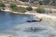 Two HH-60G Pave Hawk helicopters from the 129th Rescue Wing are battling the Jawbone Complex Fire in Kern County, Calif. The aircraft have been based out of the Tehachapi Municipal Airport in Tehachapi, Calif. since Sunday, Aug. 12. (Air National Guard photo/Master Sgt. Julie Avey)