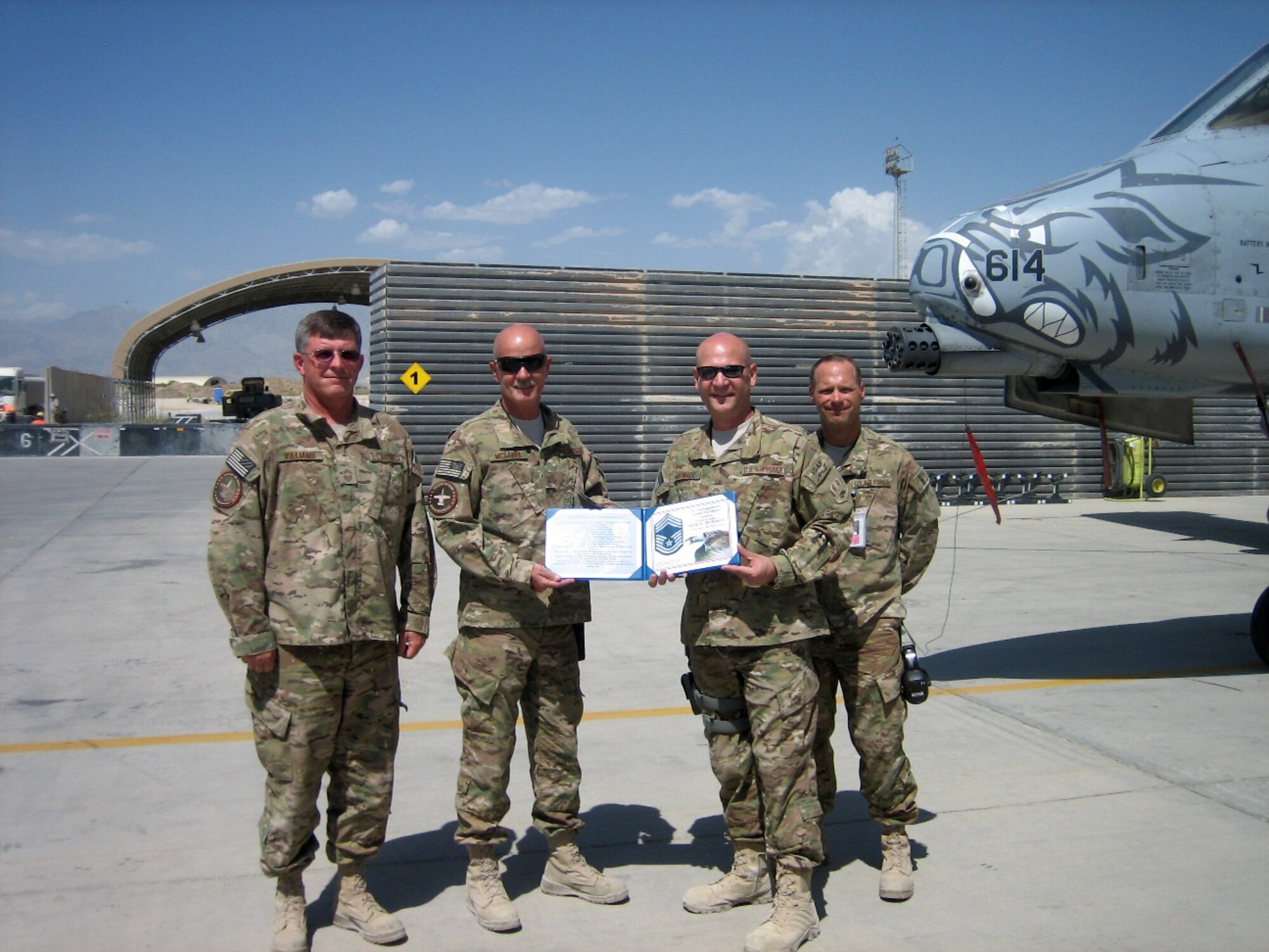 From left, Chief Master Sgt. Fred Williams, Chief Master Sgt. Mark McDaniel, Chief Master Sgt. Matthew Hopwood and Chief Master Sgt. Donnie Frederick. McDaniel was recently promoted to chief master sergeant at Bagram Airfield, Afghanistan. Williams, McDaniel and Frederick are members of the 188th Fighter Wing, which has approximately 375 Airmen currently deployed to Afghanistan in support of Operation Enduring Freedom. (Courtesy photo)
