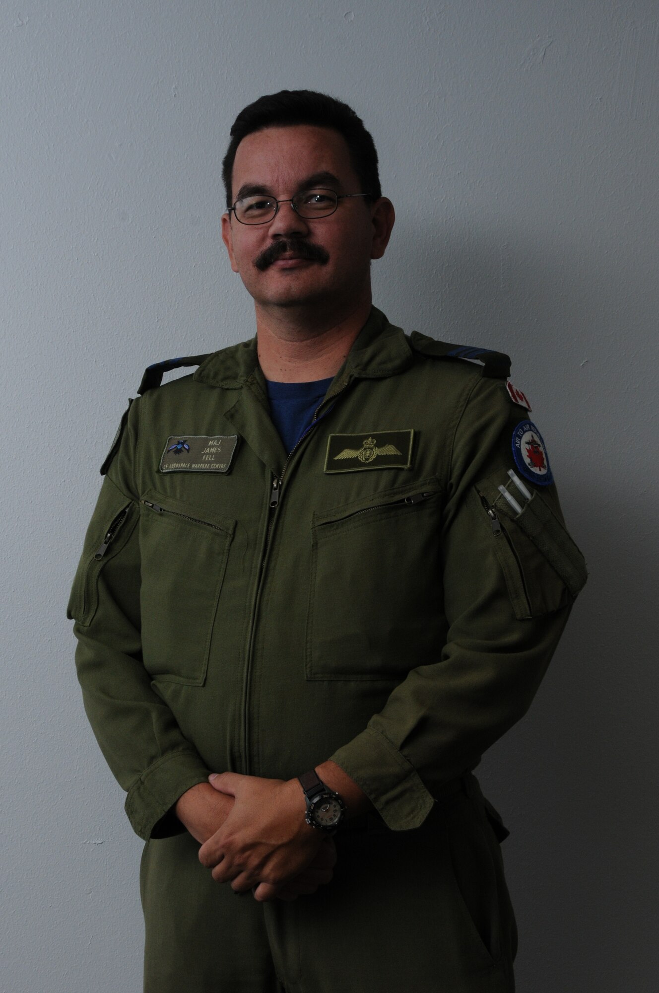 DAVIS-MONTHAN AIR FORCE BASE, Ariz. –  Maj. James S. Fell, a fighter pilot in the Canadian air force,  worked with the chief of combat operations during PANAMAX 2012 for Air Forces Southern. PANAMAX is an annual U.S. Southern Command-sponsored exercise that focuses on ensuring the defense of the Panama Canal.  One of the most important benefits of multinational exercises like PANAMAX is the fact that all the participants were able to exchange their experiences, expertise gained new knowledge about each other’s culture and people.  These interactions strengthen our bonds across the region and foster long-lasting friendships and an understanding among the partner nations, ultimately benefiting the security of the region.